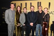 Courtney Henggeler with the cast and crew of The Boys In The Boat (Image via Getty)